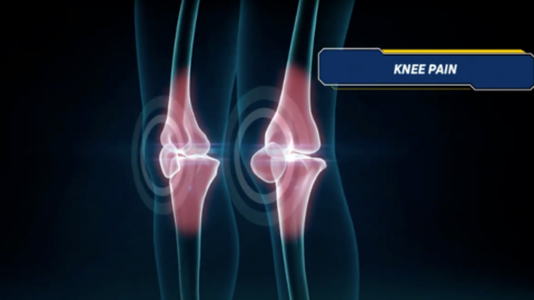 A close up of the knees of two people