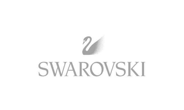 A black and white image of the word swarovski.